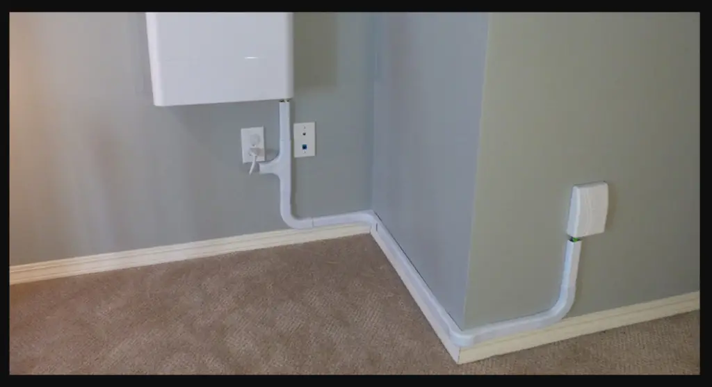 how to hide ethernet cable along wall